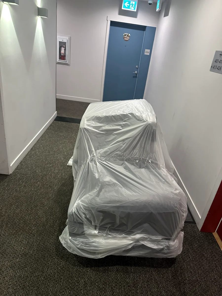 Furniture delivery through hallway